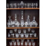 Glassware - a cut glass decanter, with silver collar,