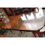 A George III mahogany dining table,