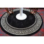 A contemporary circular hand made Chinese carpet/rug,