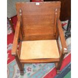 A 20th century oak monk's type chair, square top metamorphosing into a chair back, 53.