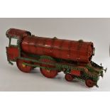 Meccano Construction Toys - a built locomotive and tender, red and green body, push a long action,