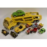 Tonka Toys - a yellow articulated car transporter, a Sidewinder green Beetle, yellow beach buggy,
