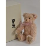 Steiff - a Margaretes limited edition musical teddy bear, in rose mohair, white ear tag and button,