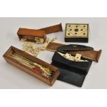 Games - a 19th century miniature full set of double six bone dominoes, each irregular hand cut,