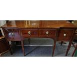 A 19th century mahogany break-centre sideboard, oversailing top above three drawers,