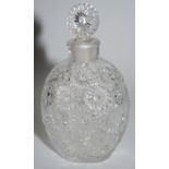 A Lalique clear and frosted glass scent bottle and stopper, in relief with with daisies, 9cm high,