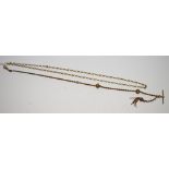 A 9ct gold diamond cut belcher necklace 10.3g; a yellow metal Albert chain and T bar.