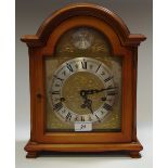 A walnut bracket clock, Tempus Fugit.