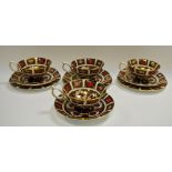 Royal Crown Derby - 1128 Imari four cups and saucers, three side plates,