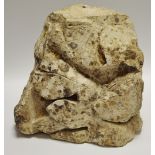 A Medieval masonry limestone architectural corbel, naturalistically carved as a leaf, 26cm high,