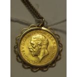 A George V sovereign,1931, mounted in a pendant and necklace 12.