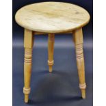 A Victorian pine cricket table, circular top, turned outswept legs, 73cm high, 52cm diam, c.