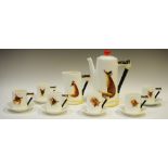 `Reynard The Fox` - a Royal Doulton coffee set, modelled in low relief with a seated fox,
