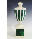 A 19th century white marble and malachite urn, the urnular body inlaid with vertical bands,