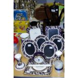 Wedgwood Cornucopia pattern mantel clock, pair or candle sticks, 4 oval easel photo frames,