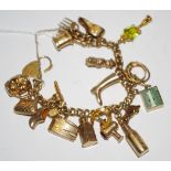 A 9ct gold charm bracelet and charms,