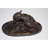 French School (late 19th century), a dark patinated animalier bronze, of a recumbent fox, oval base,