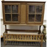 A French oak farmhouse dresser, two glazed doors enclosing shelving to top,