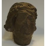 An 18th century basalt head, Indonesian origin.