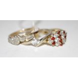 A 9ct gold navette shaped cluster ring set with white and red stones;