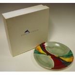 A Poole pottery plate;