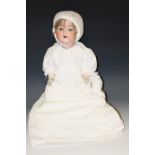 Armand Marseille - a 990 socket doll, fixed blue eyes, open mouth, light brown wig,