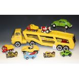 Tonka Toys - a yellow articulated car transporter, a Sidewinder green Beetle, yellow beach buggy,