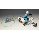 A vintage Shinsei Asahi (Japan) tin plate and plastic remote control Honda police motorcycle,