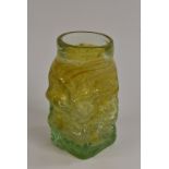 A uranium type vaseline glass slab sided vase of irregular form, circular neck, square base,
