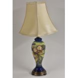 A Moorcroft Primrose pattern slender inverted baluster table lamp,