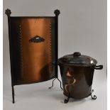 An Arts and Crafts copper coal bucket, the domed cover embossed with three loveheart shapes,