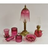 A late 19th century cranberry glass and lacquered brass columnar table tamp, etched shade,