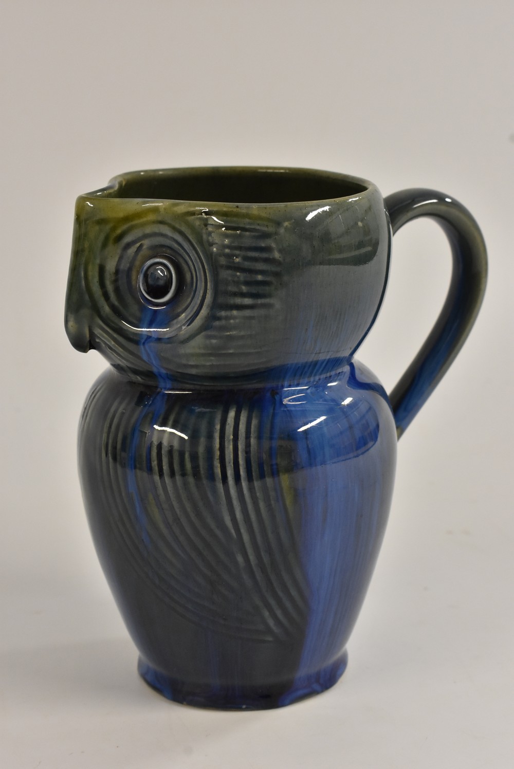 A Bourne Denby Danesby Ware Electric Blue pattern novelty Owl jug, sgraffito inscised,