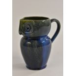 A Bourne Denby Danesby Ware Electric Blue pattern novelty Owl jug, sgraffito inscised,