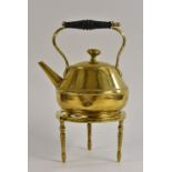 An Arts and Crafts brass tea kettle, designed by Matthew J Hart and Sons, Birmingham,