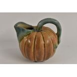 An unusual Bourne Denby lobed ovoid pumpkin shaped jug, loop handle, lipped spout, 13.