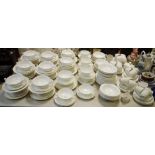 White tea and dinner ware including assorted two handled soup bowls, dessert dishes and plates,
