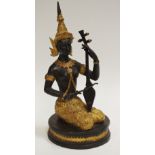 An Indian deity of a traditional musician, seated, plinth base,