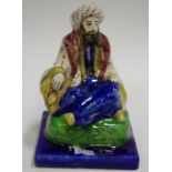 A 19th century glazed figure,