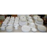 White ceramics - two tureens, two handled soup bowls, dinner plates, dessert plates, soup bowls,