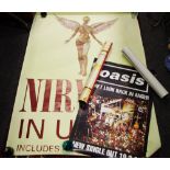 Music interest - a Nirvana poster titled 'UTERO includes Heart Shaped Box' and an image of a