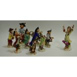 A nine piece Meissen style Monkey band, conductor, Drummer, Bassist, flutist,