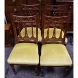 Four Victorian mahogany dining chairs, shaped splats,