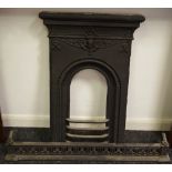 A Victorian cast iron bedroom fire surround;