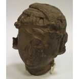 An 18th century basalt head, Indonesian origin.