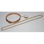 A 9ct rose gold hinged bangle 10.9g; a 9ct gold belcher necklace 7.