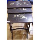A Chinoiserie nest of three tables.