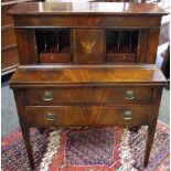 A reproduction mahogany Bon heure du jour, central cupboard, shield and eagle motif,