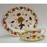 A Royal Crown Derby Bali oval serving plate, sauceboat and stand,