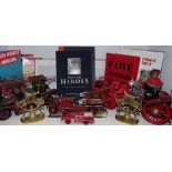 Fire Service Interest - four model fire engines; a pair of brass flat backs surmounted with helmet;